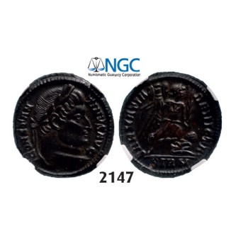 Lot: 2147. Roman Empire, Constantine I, 307-­337 AD, Æ3 (Nummus) (Struck 324 AD) Sirmium, Billon (3.41g), NGC Ch AU